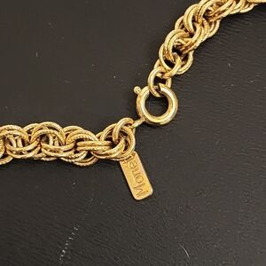 Women's Monet gold rope necklace 24" excellent like new condition.  stamped